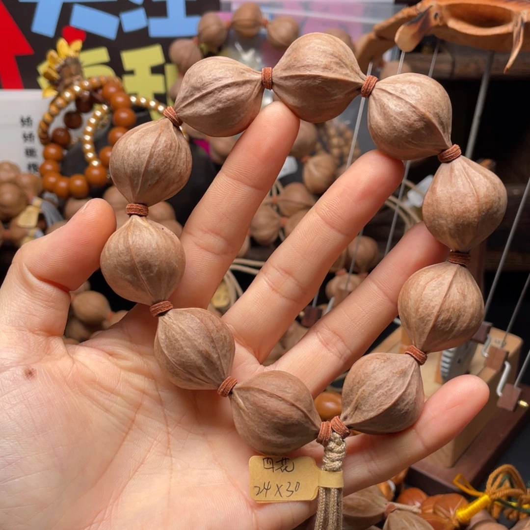 7***叔橄榄核吊坠2430四花铁核