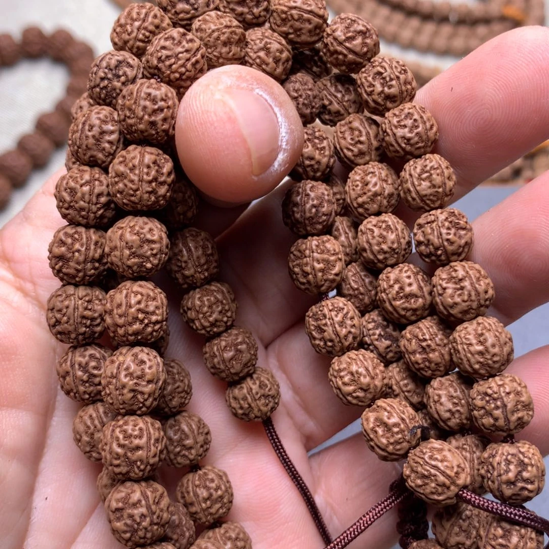 T***m金刚菩提吊坠微黄头一代盘龙108