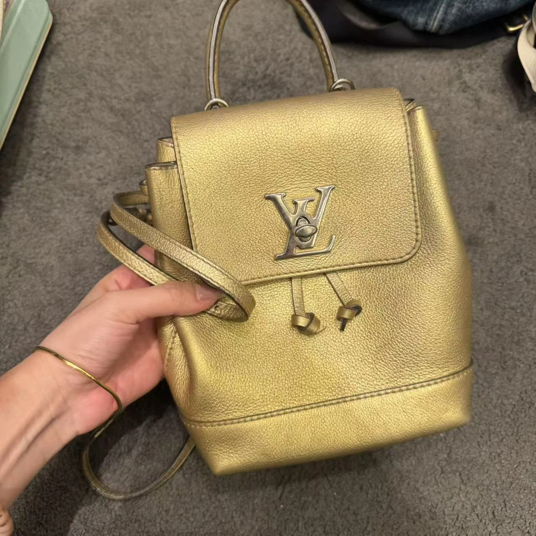 95新 LouisVuitton/路易威登 金色双肩包/非真假不退补不换