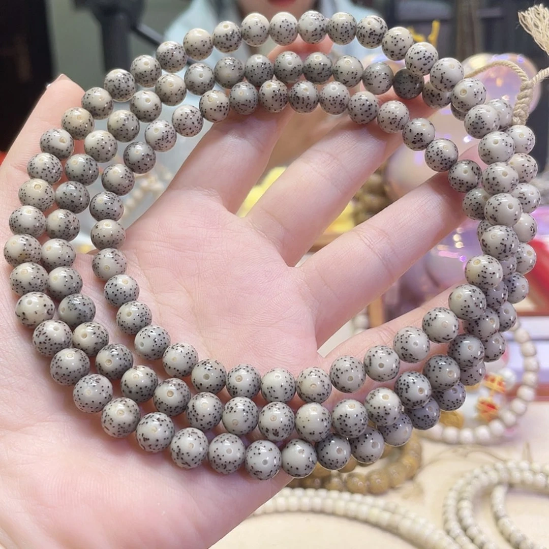 吊坠星月菩提赵**?星月菩提海南同枝果8x8