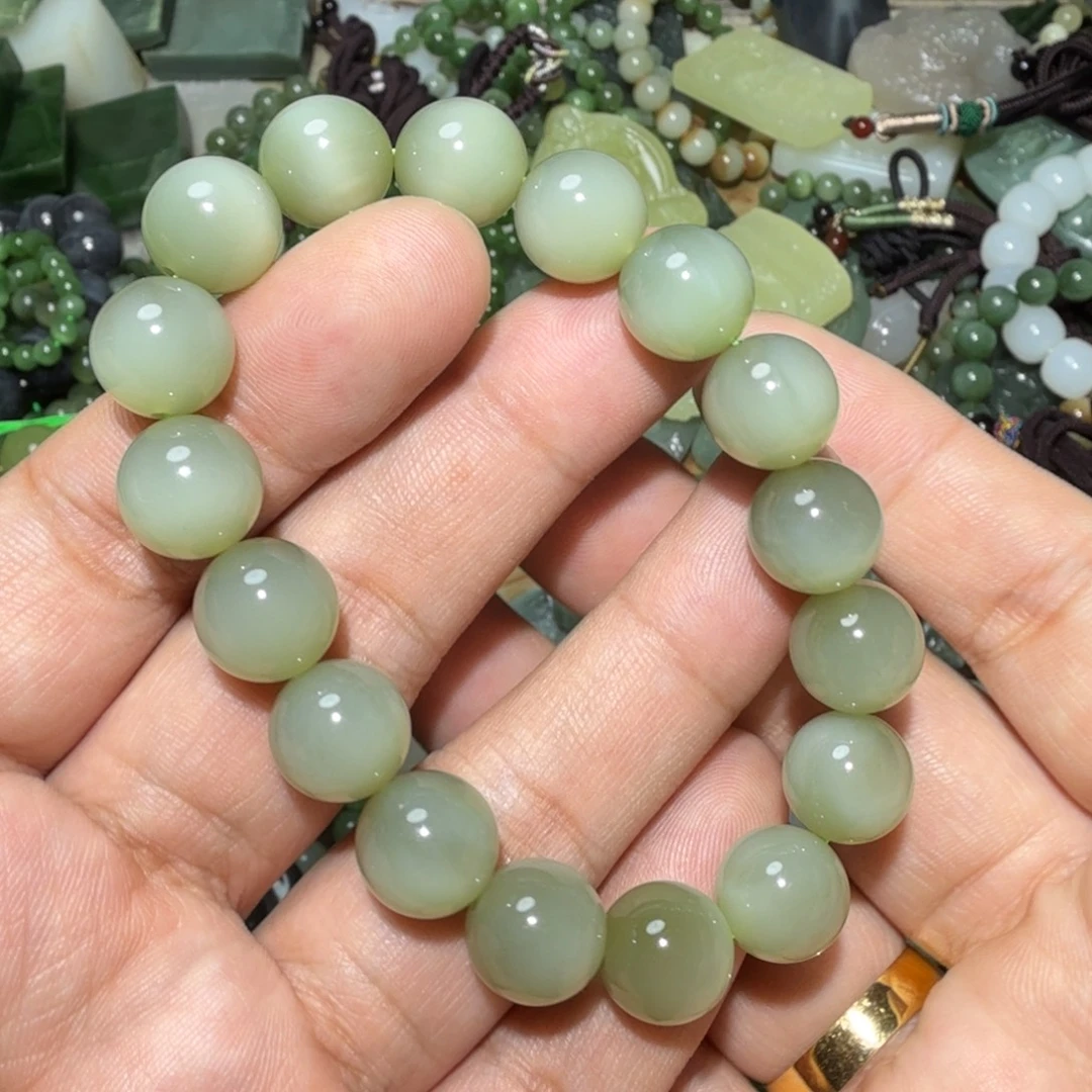 君***梨和田玉未镶嵌挂件