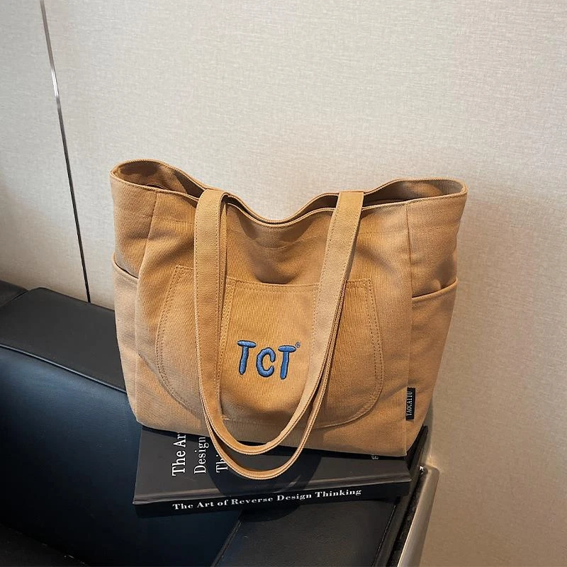 帆布包包女式2025新款休闲轻便百搭单肩包大容量托特包上课通勤包