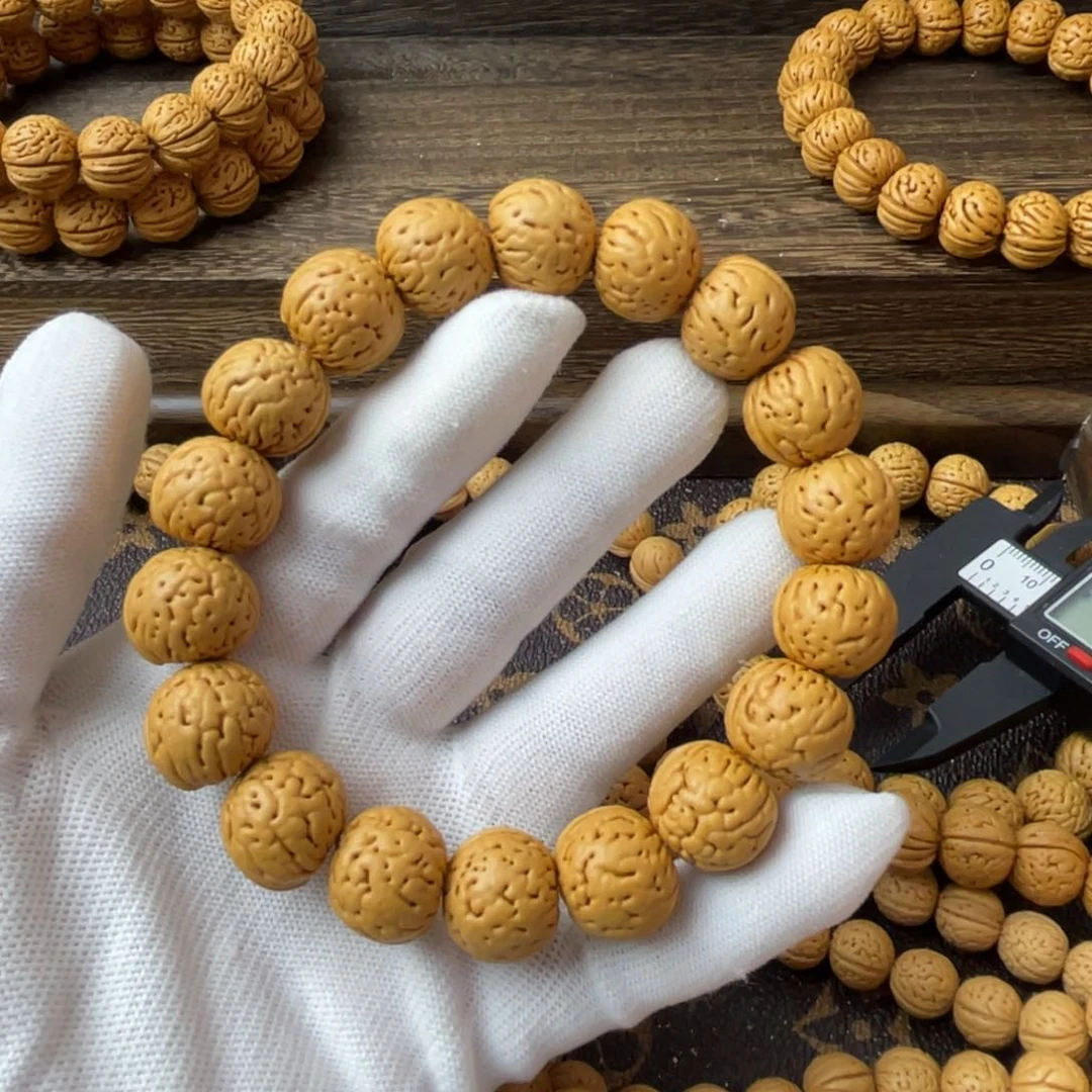 吊坠桃核开**点金丹手串