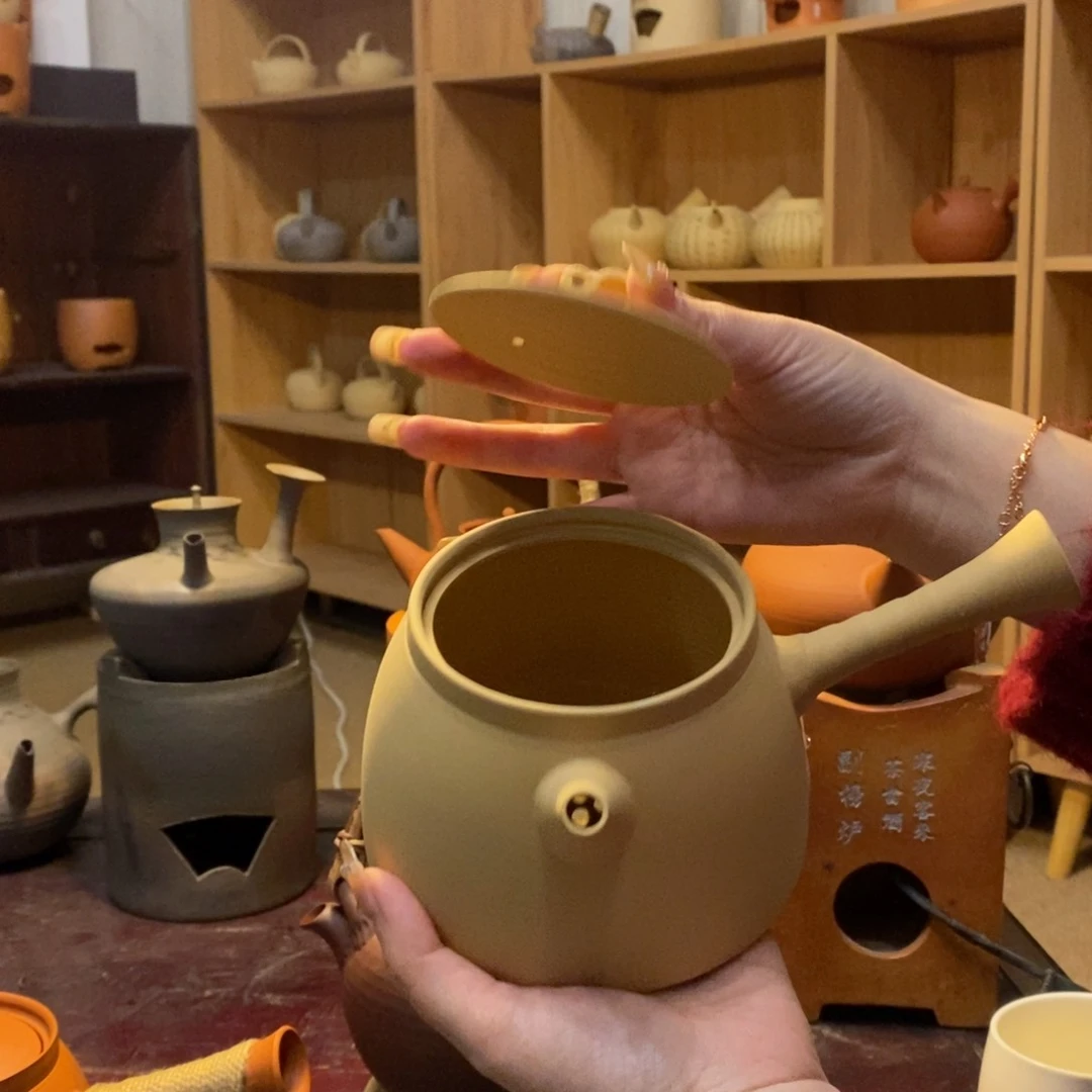 陶煮海白泥侧把壶700c