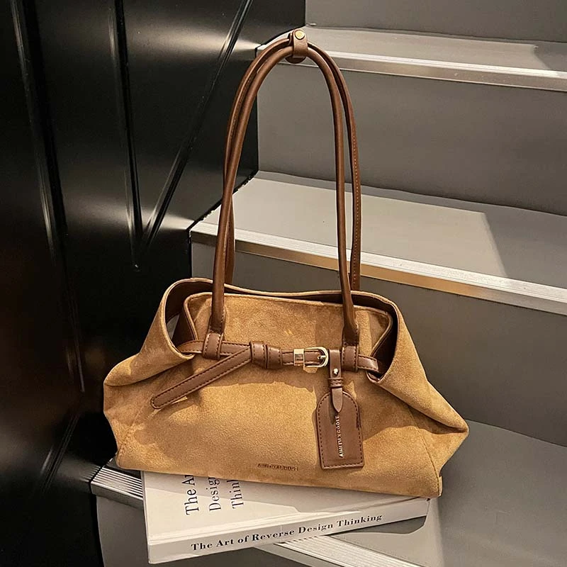 艾米兔 X COOLE女包2025新款通勤气质潮流小众设计ins单肩手提包