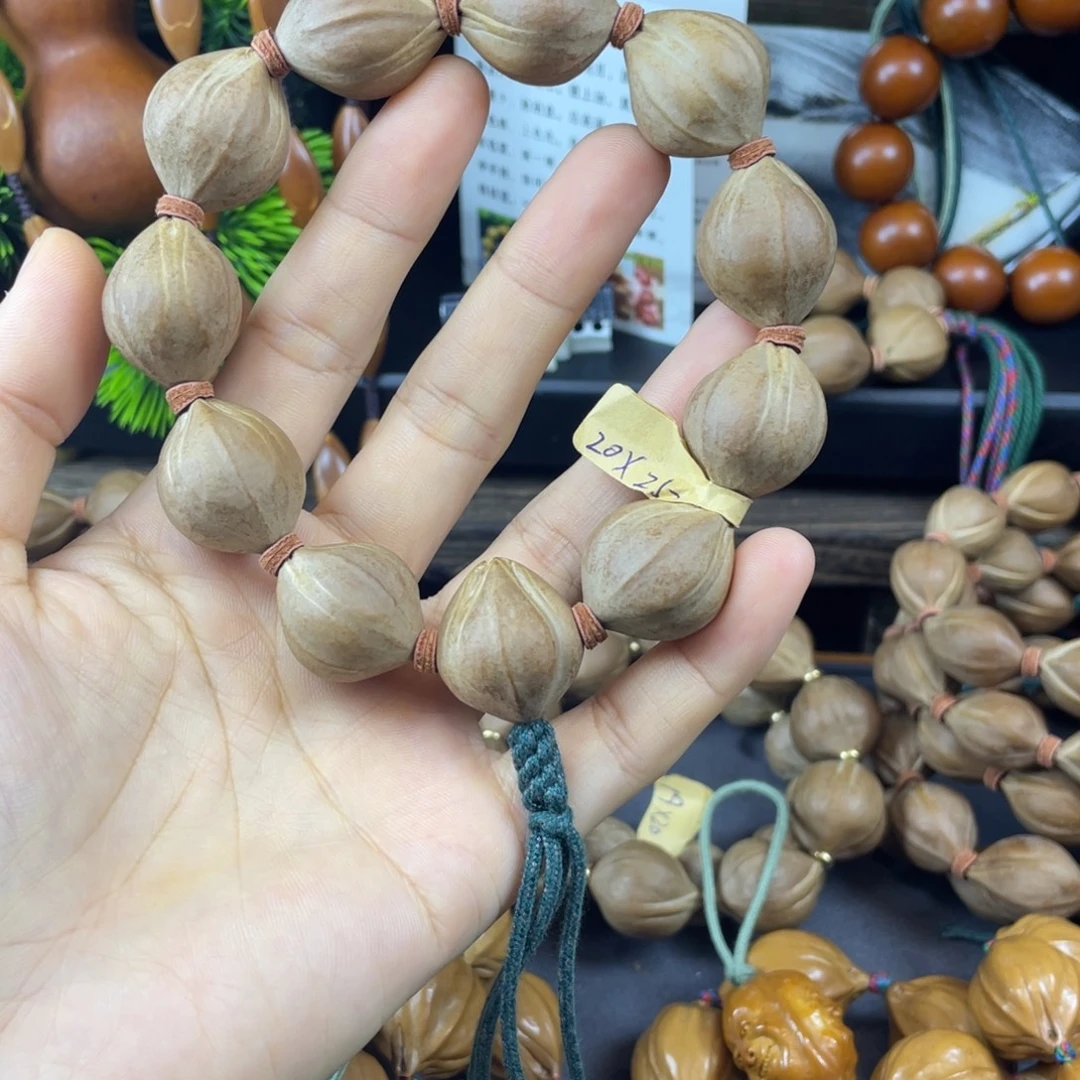 *****吊坠橄榄核001四花铁核