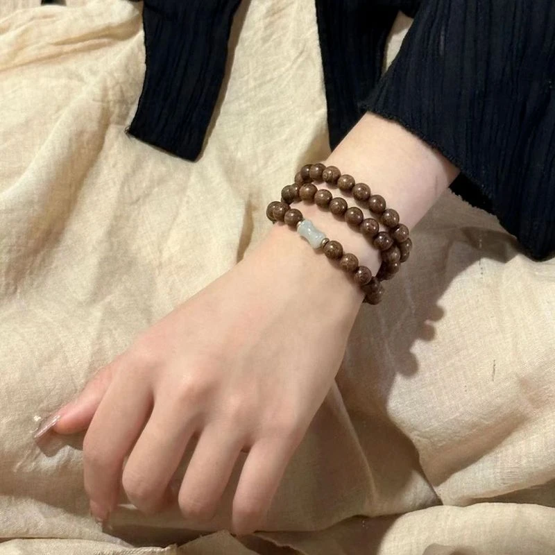 金丝檀木复古禅意招财纳福东陵竹节钰珠佛珠国风小众设计多圈叠戴