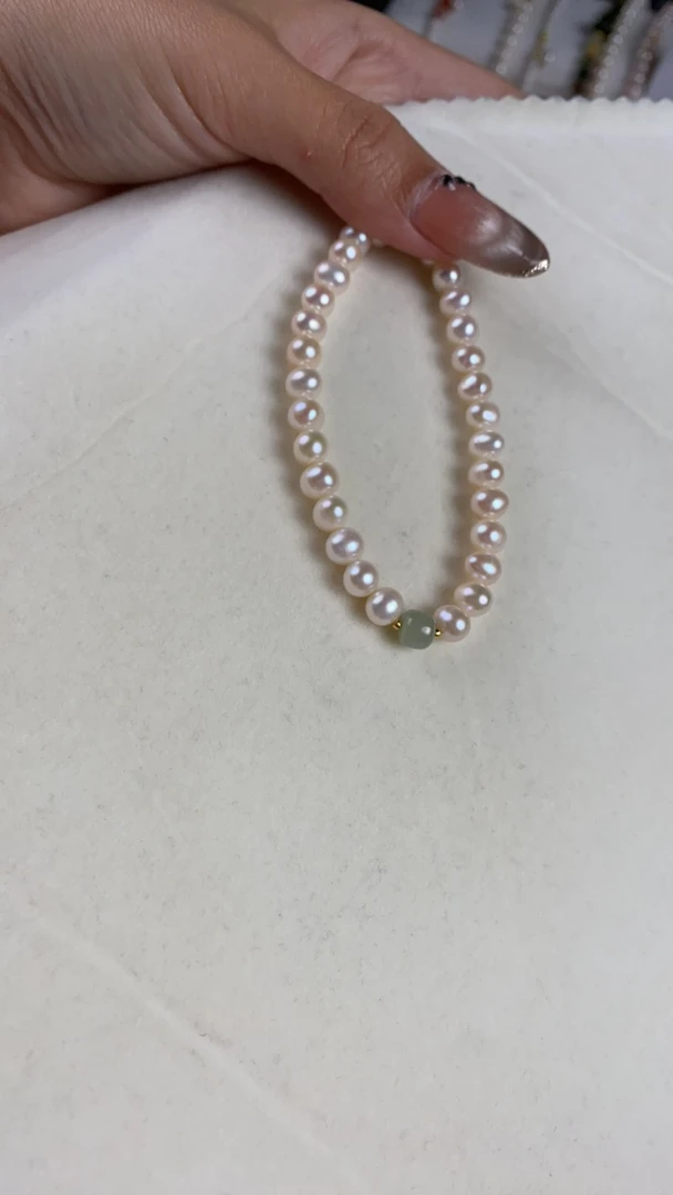 5-6和田玉珍珠手串一级强光