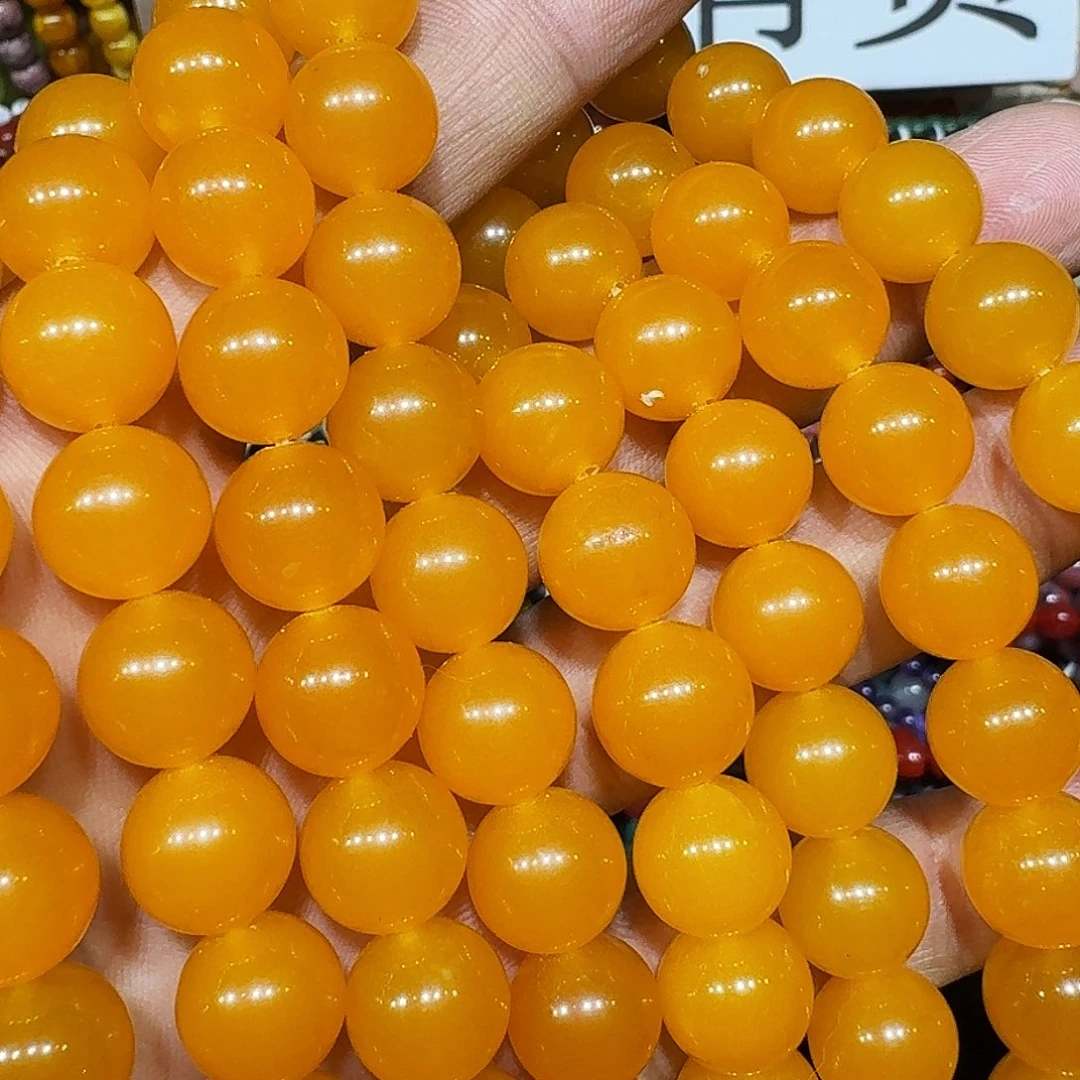 玛瑙/玉髓未镶嵌珠宝半成品老黄雨12mm一条