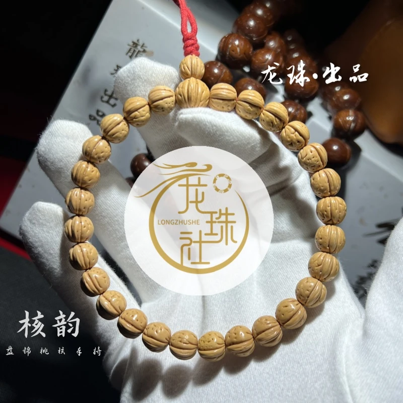 “核韵”桃核手持【龙珠社国核】盘锦桃核.抛光 尺寸误差0.5mm之间