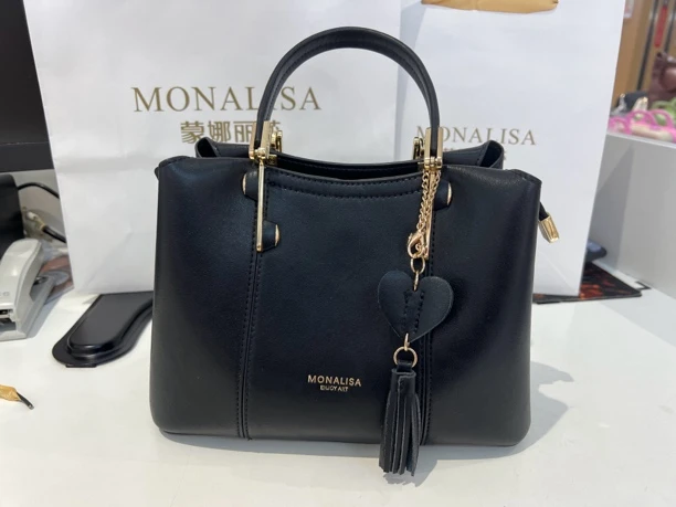 蒙娜丽莎牛皮简约手提黑色百搭