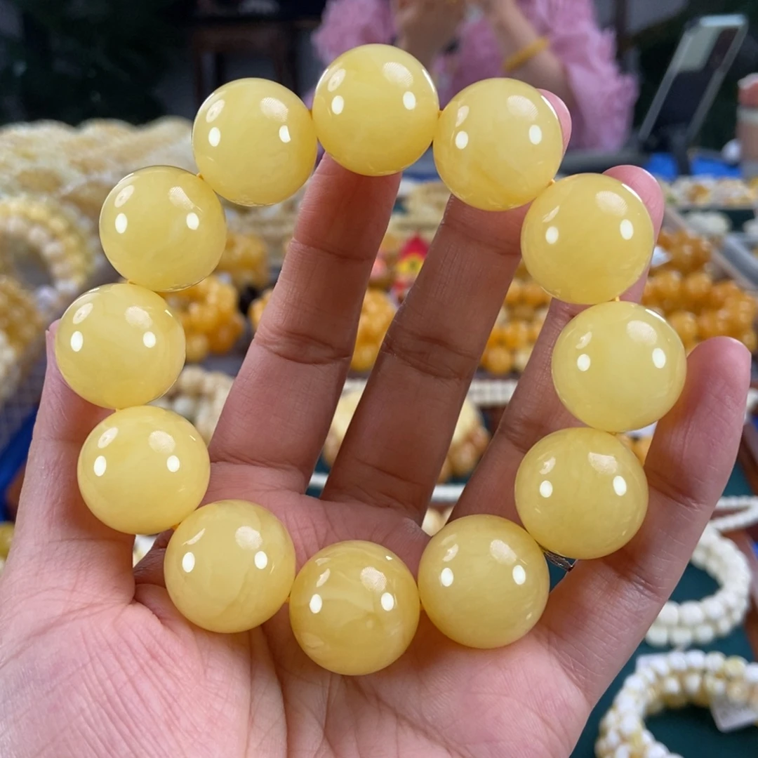 琥珀未镶嵌珠宝奇石20同料鸡油黄圆珠54.48