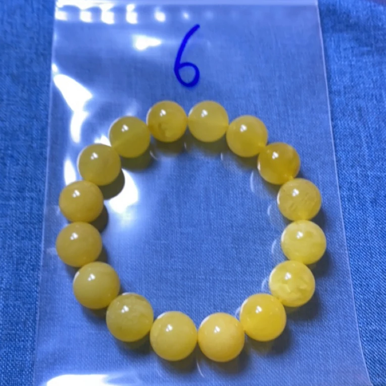 天然蜜蜡鸡油黄14加圆珠手串