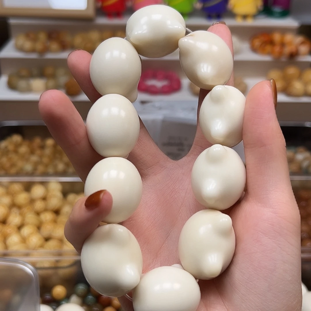 手串菩提根/象牙果瑕疵卡30左右猫头手持一串