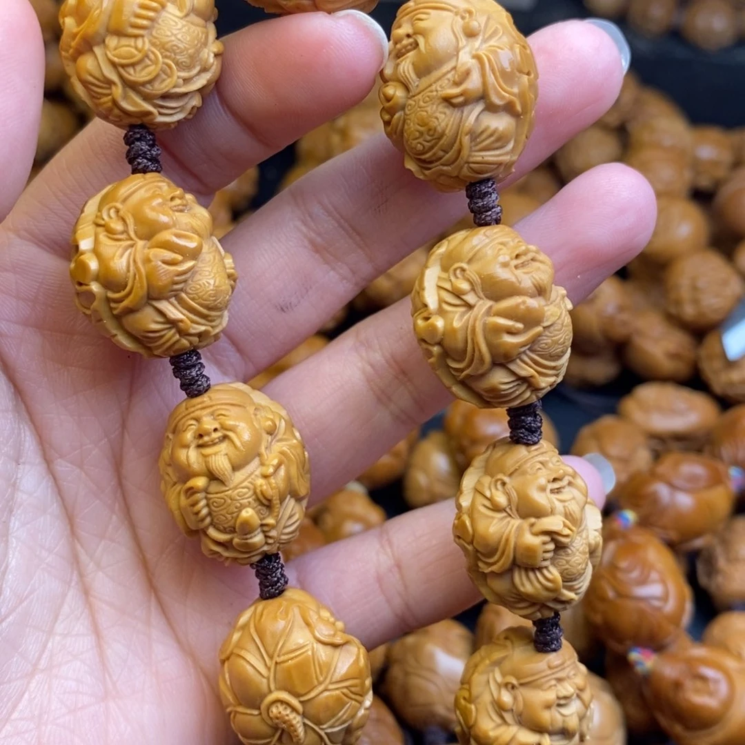 橄榄核吊坠荷叶财神1.8