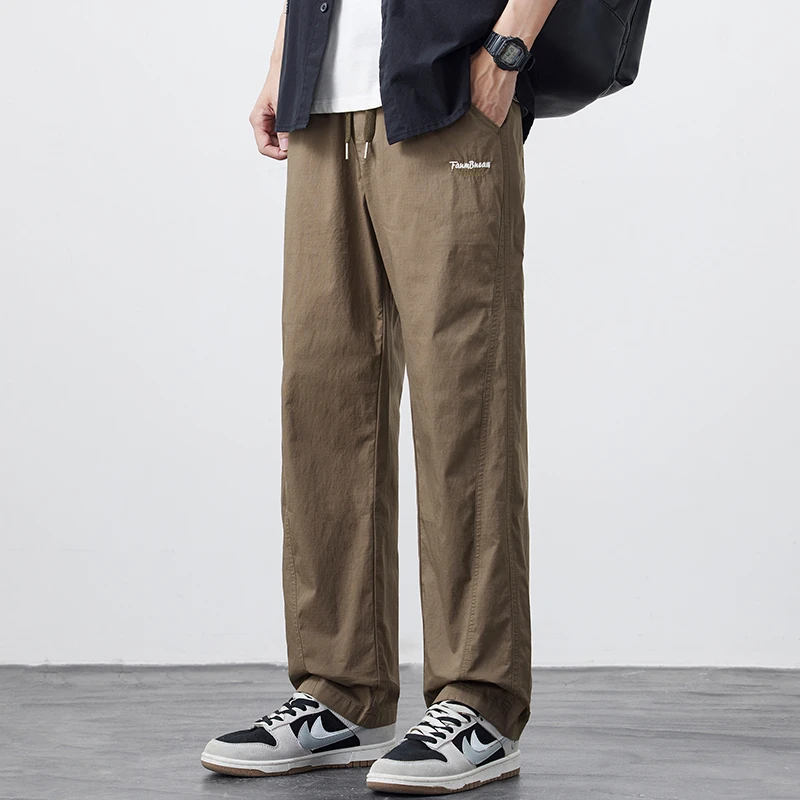 Kuvine夏季薄款凉感简约宽松直筒休闲裤男款松紧腰新款垂感阔腿裤