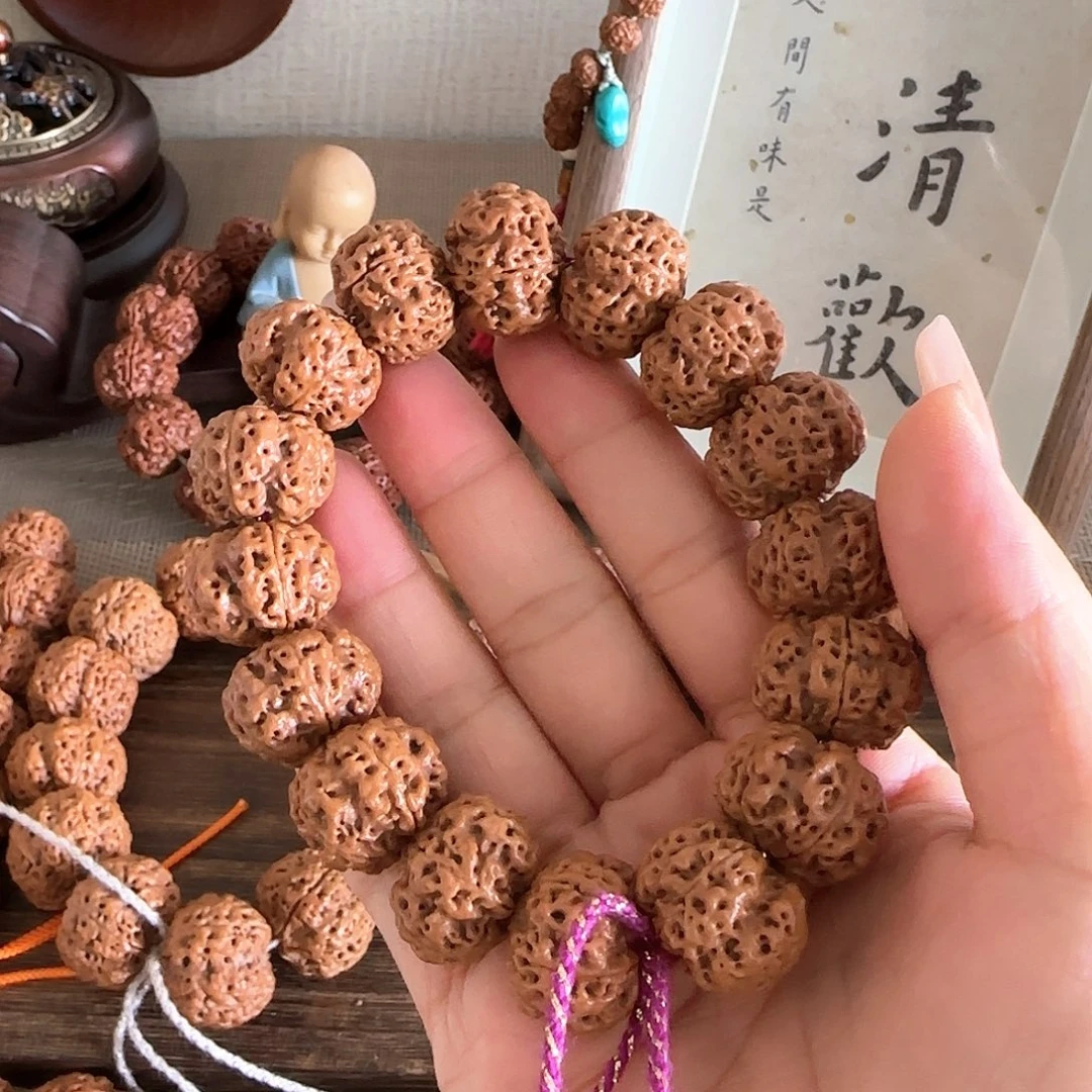 配***角手串库克纽扣梅花