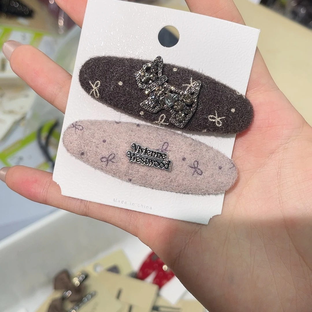 布艺非金属粉咖蝴蝶结小狗