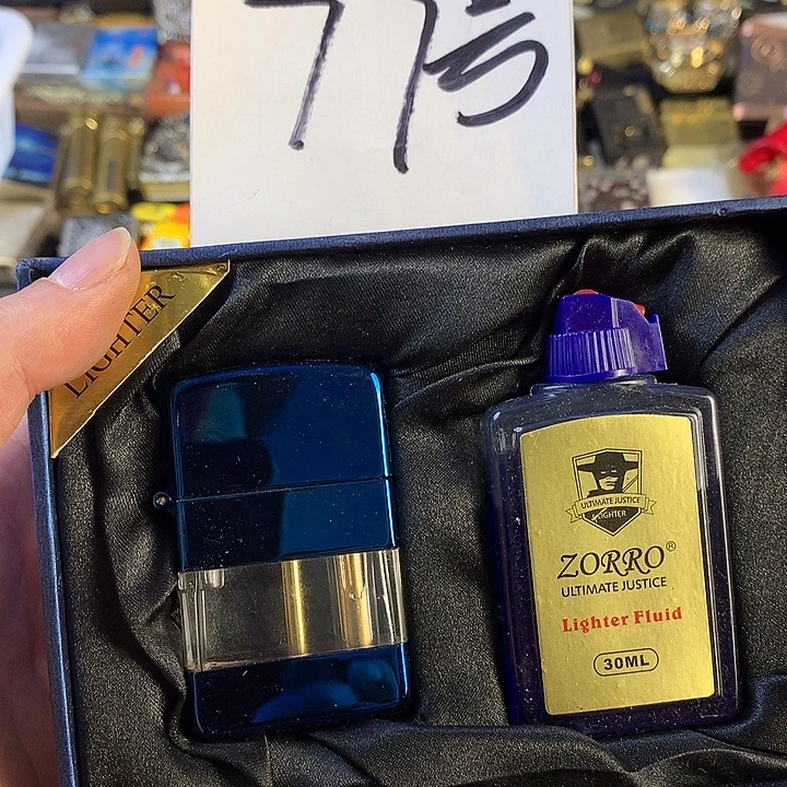 恋****77号打火机火火一个