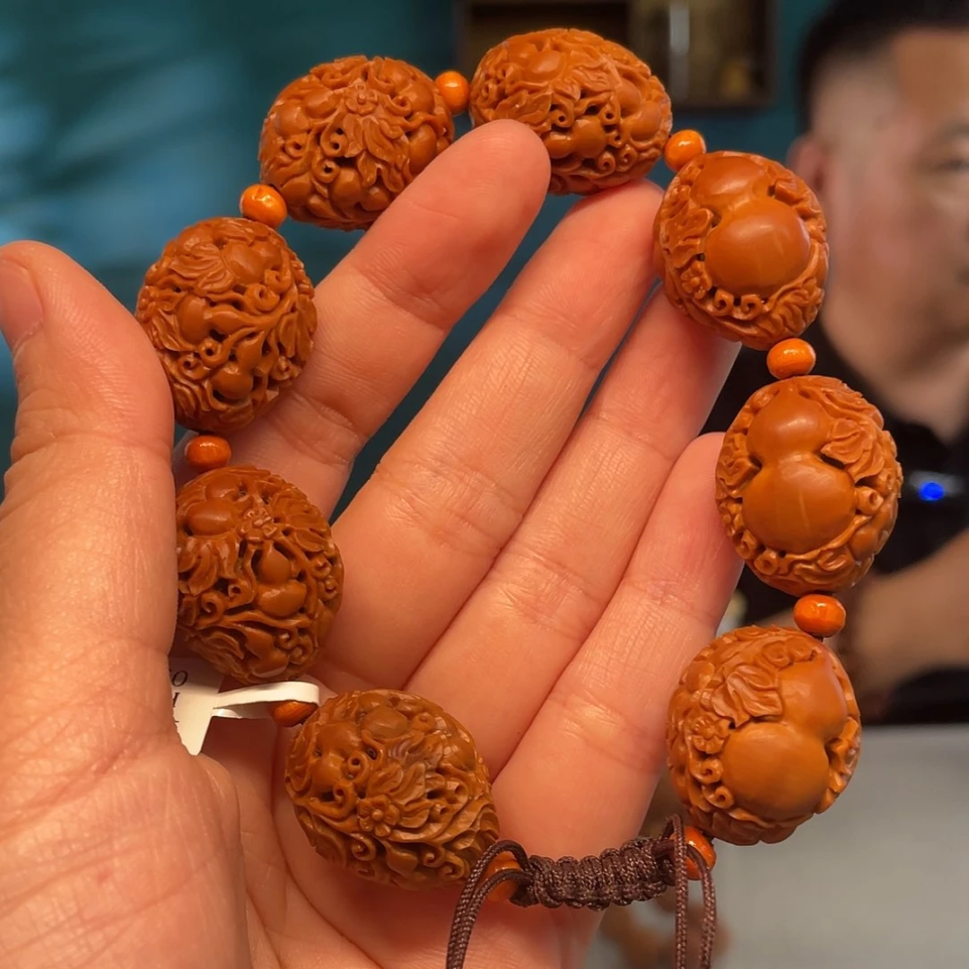 橄榄核福禄万代核雕作品