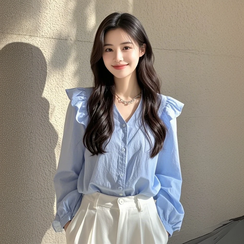 流行漂亮小衫轻奢春季高级法式小众绝美设计蓝色长袖衬衫新款上衣