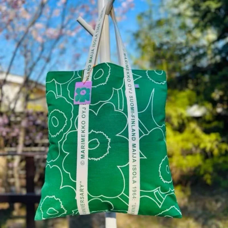 A7帆布包白条字母单肩包