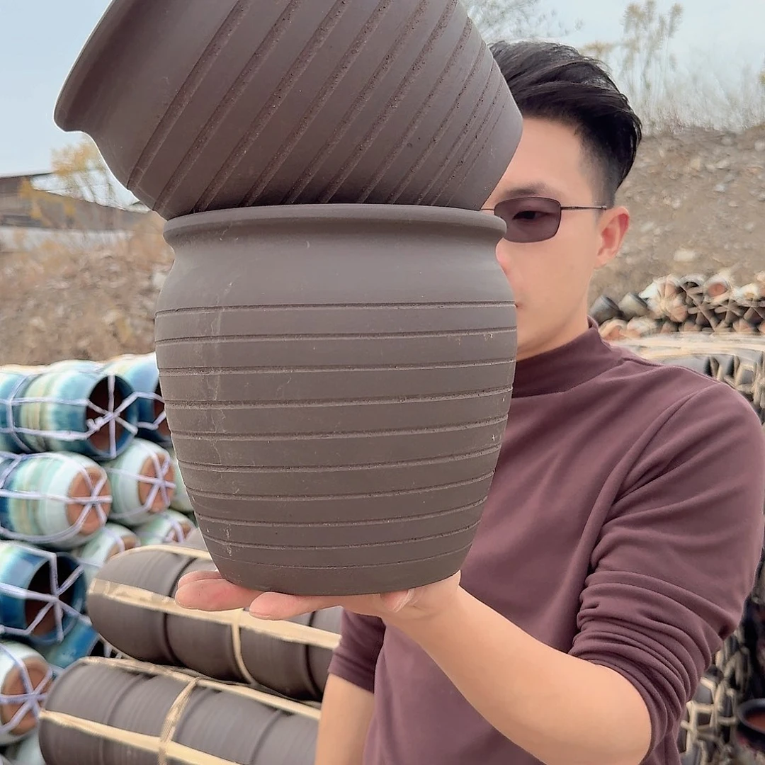 紫砂花盆口20高20（两个黑金刚