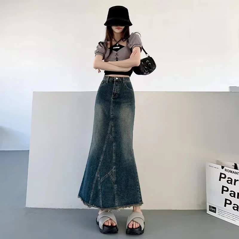 后开叉高腰显瘦牛仔半身裙女2024秋季新款毛边设计感小众包臂裙女