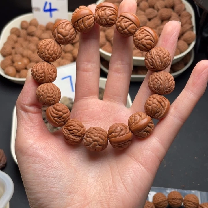 桃核吊坠把**欢荔枝纹手串