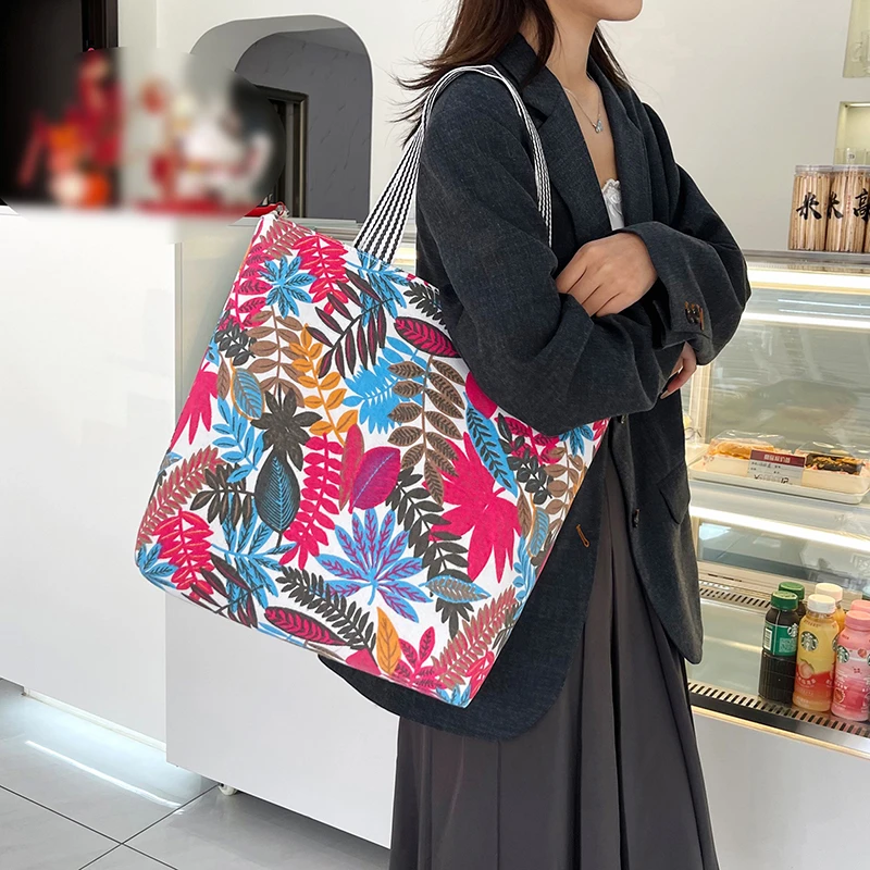 大容量民族风通勤单肩帆布包包女新款学生上课包购物手提袋托特包