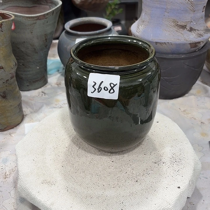 摆件瑕疵处里高15，口9，有孔