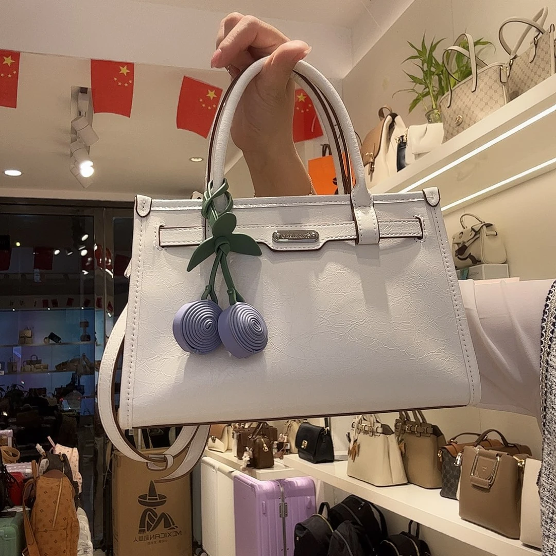 牛剖层皮革稻草人女士手提斜挎手提包