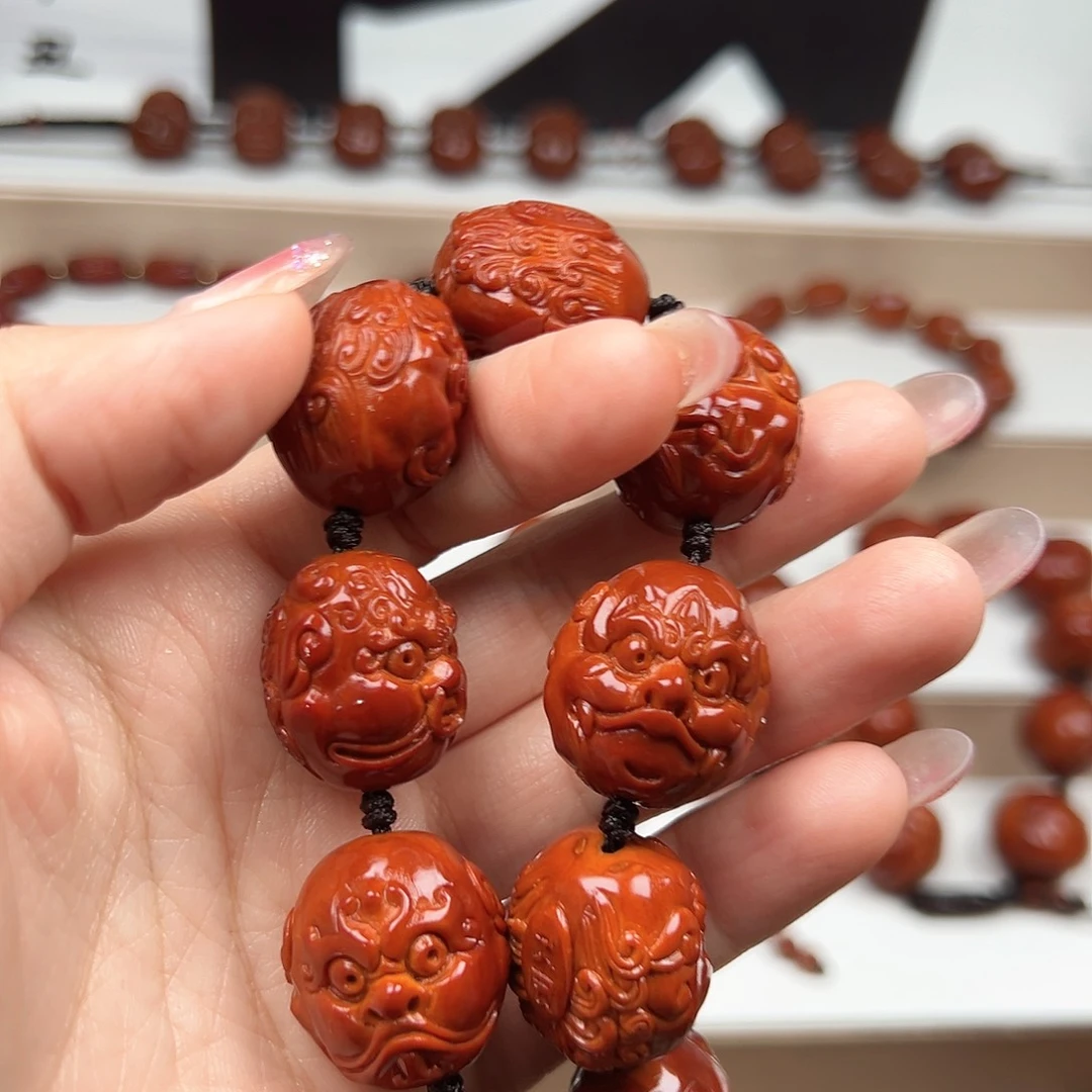 孙***来手串橄榄核龙生九子