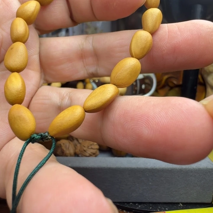 赵***宏橄榄核手串/手链哈哈我也是很喜欢的呢