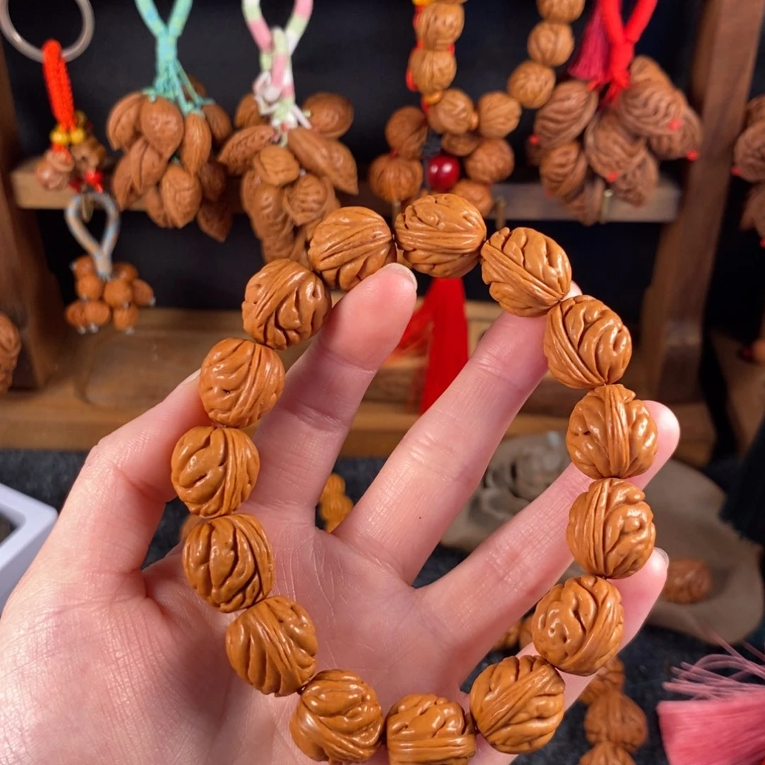 吊坠桃核桃枭手串