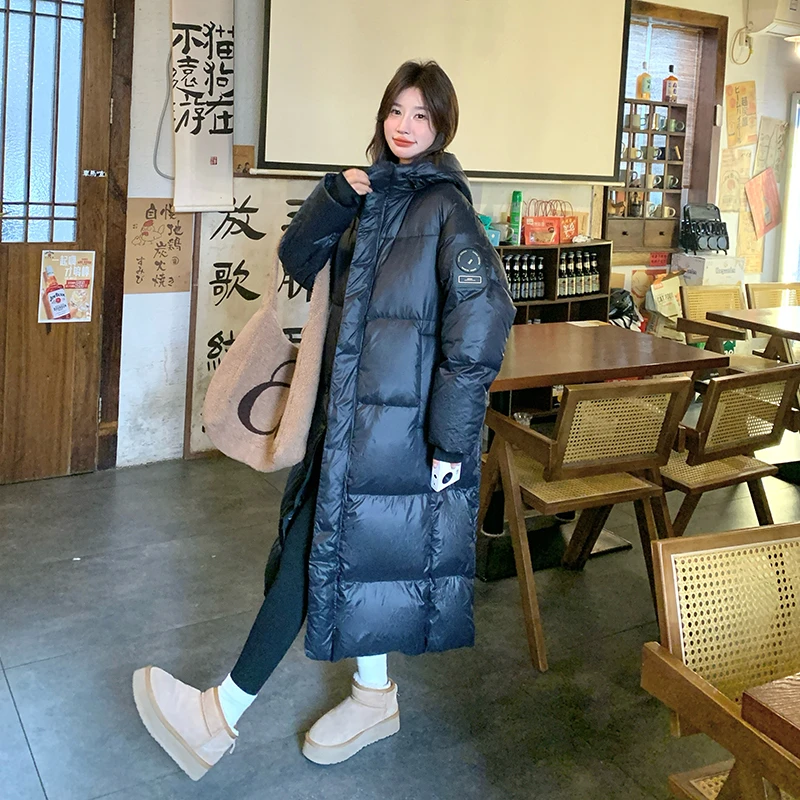 黑色连帽羽绒服女2025冬季中长款时尚韩系高级感白鹅绒面包服外套