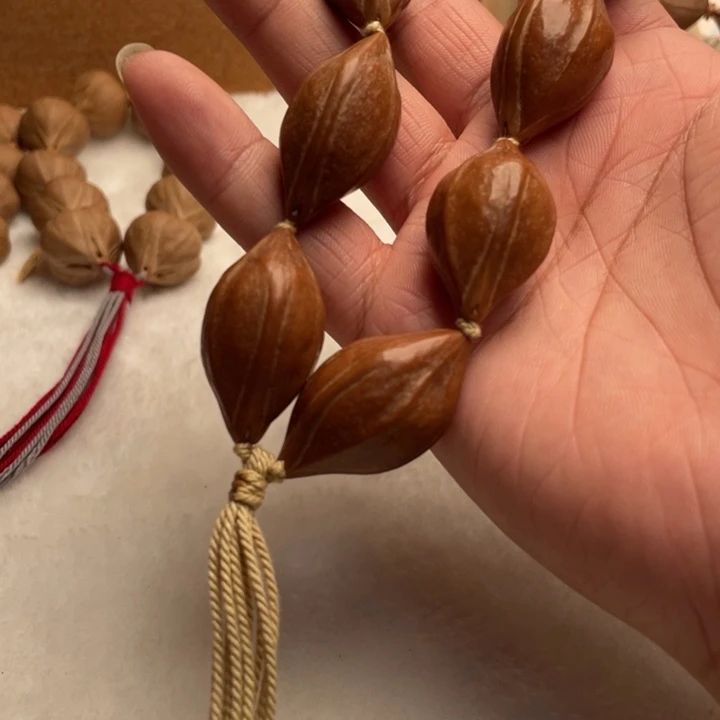 橄榄核吊坠梅林老料手持