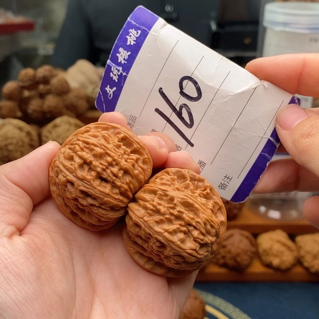 文玩核桃把件40白狮子