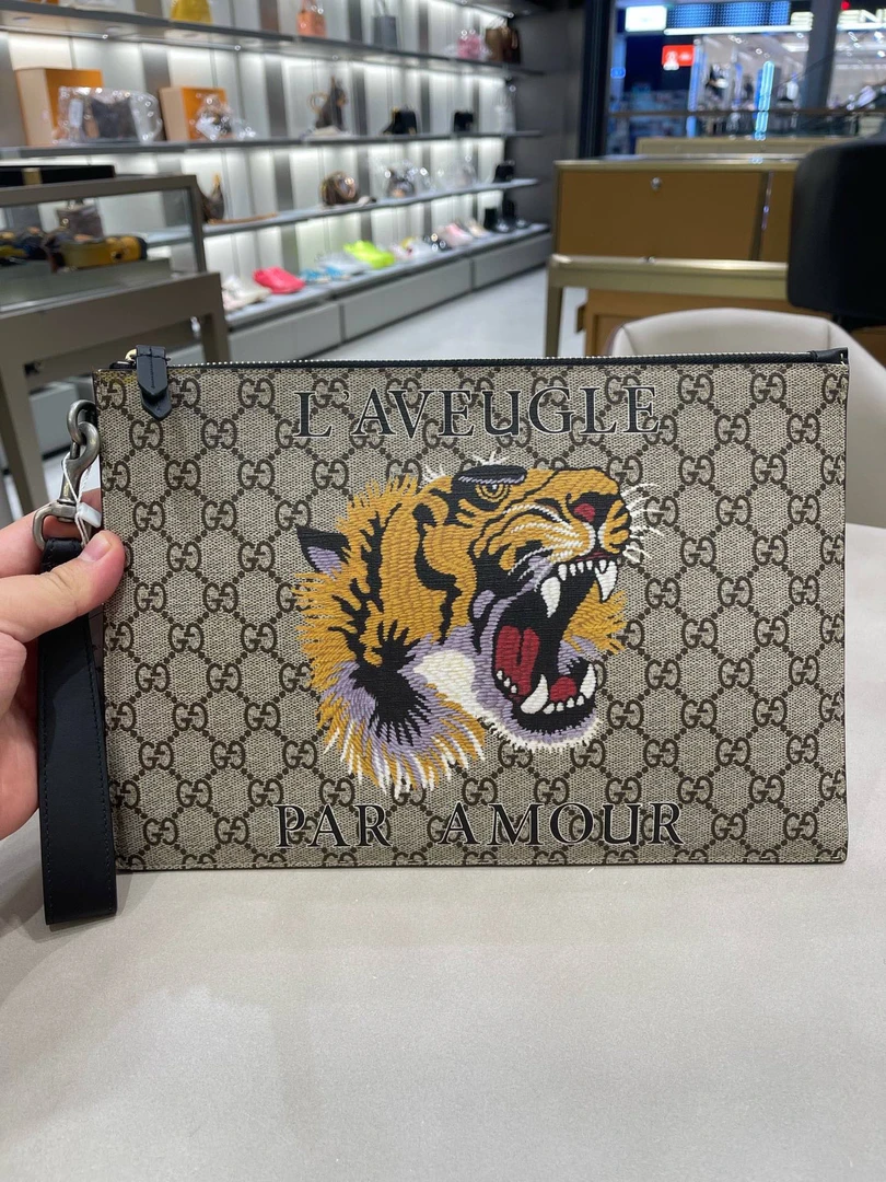 99新 GUCCI/古驰 G8-9虎头手拿包长30.5cm 宽1.5cm 高21cm