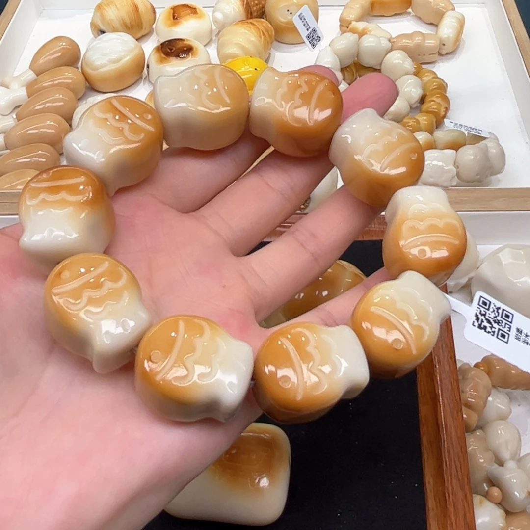 无***猴手串菩提根/象牙果8.22.12象牙果渐变鱼饼瑕