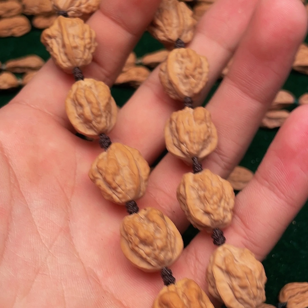 M***金吊坠文玩核桃异性