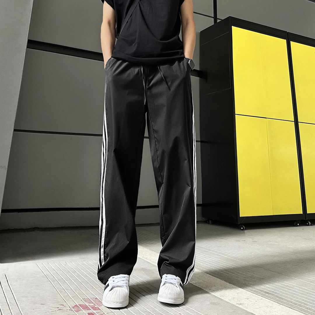 QUALCOMM三条杠设计运动休闲裤男夏季薄款透气激光打孔垂感直筒裤