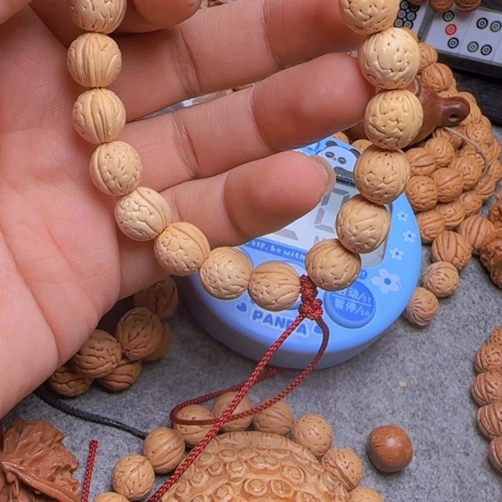 ¹****7拍709野生桃核奶油核手持一条