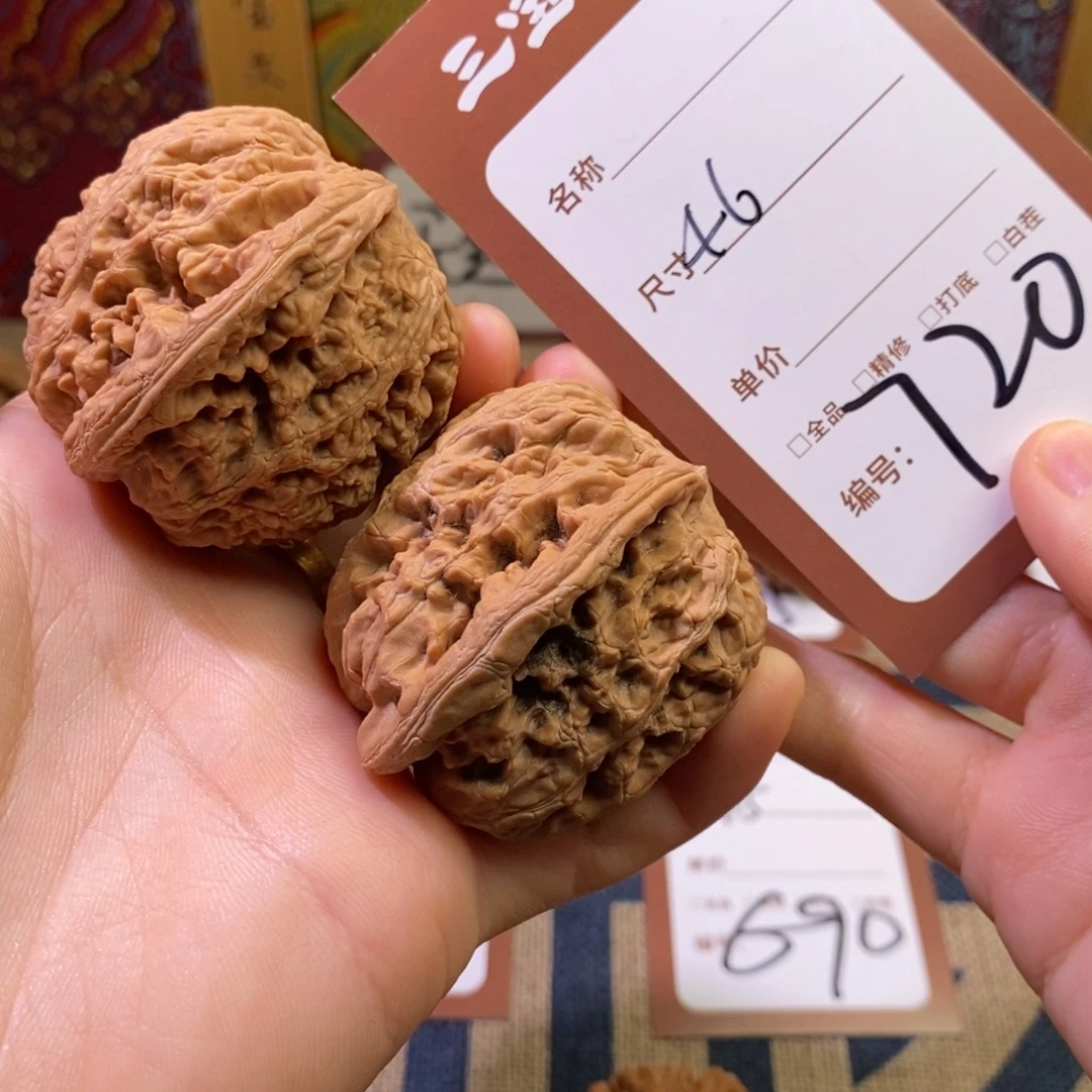 你***假把件文玩核桃46将军膀720。