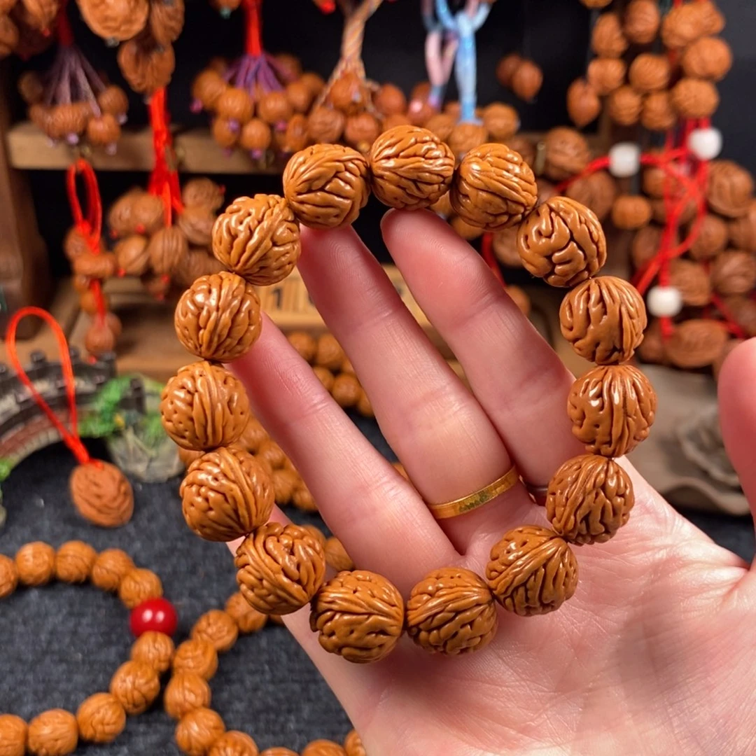 吊坠桃核桃枭手串