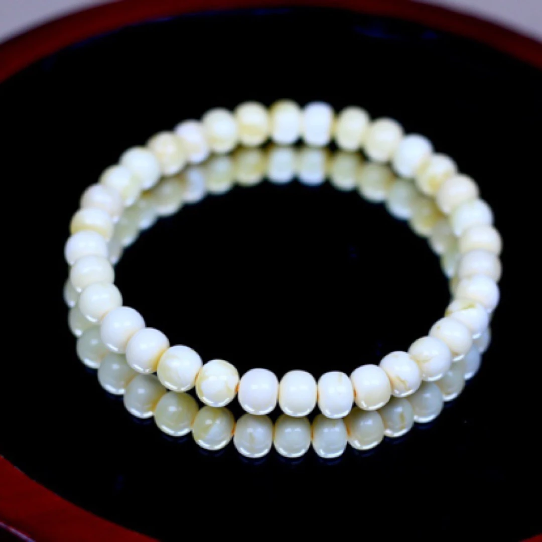 6.2mm俄料白蜜算盘珠手串 4.1克，比较少的器型，上手也很可爱，