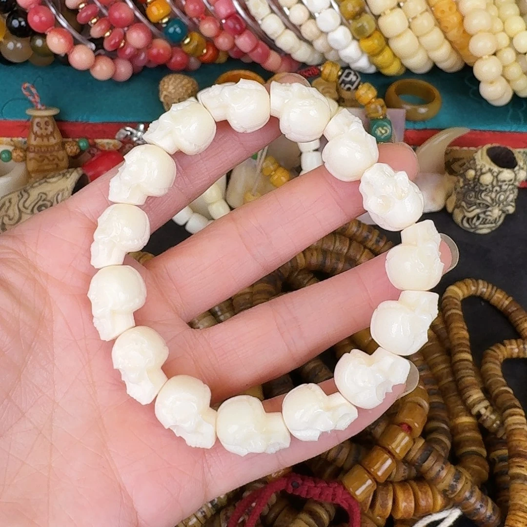 驼骨其他y*u瓷白骷髅头手串12颗