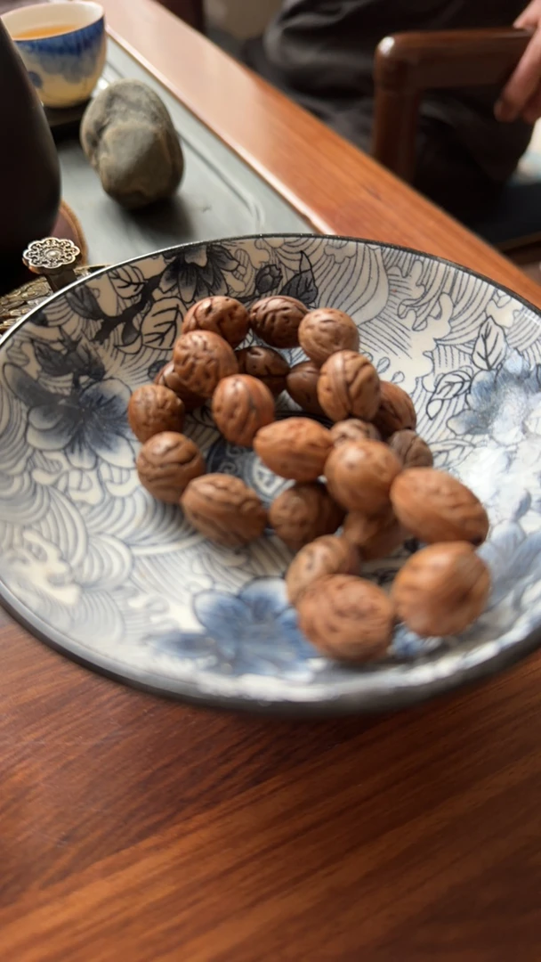 真山桃核拍打袋养生捶背按摩棒经络拍打工具