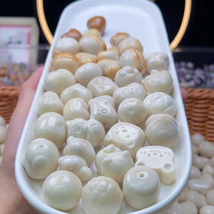 吊坠白玉菩提b15-25mm/5颗象牙果瑕