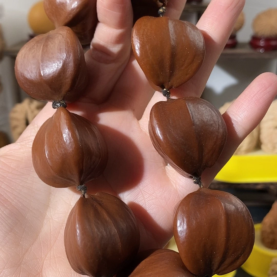 吊坠文玩核桃乖*狼橄榄核手持9颗30
